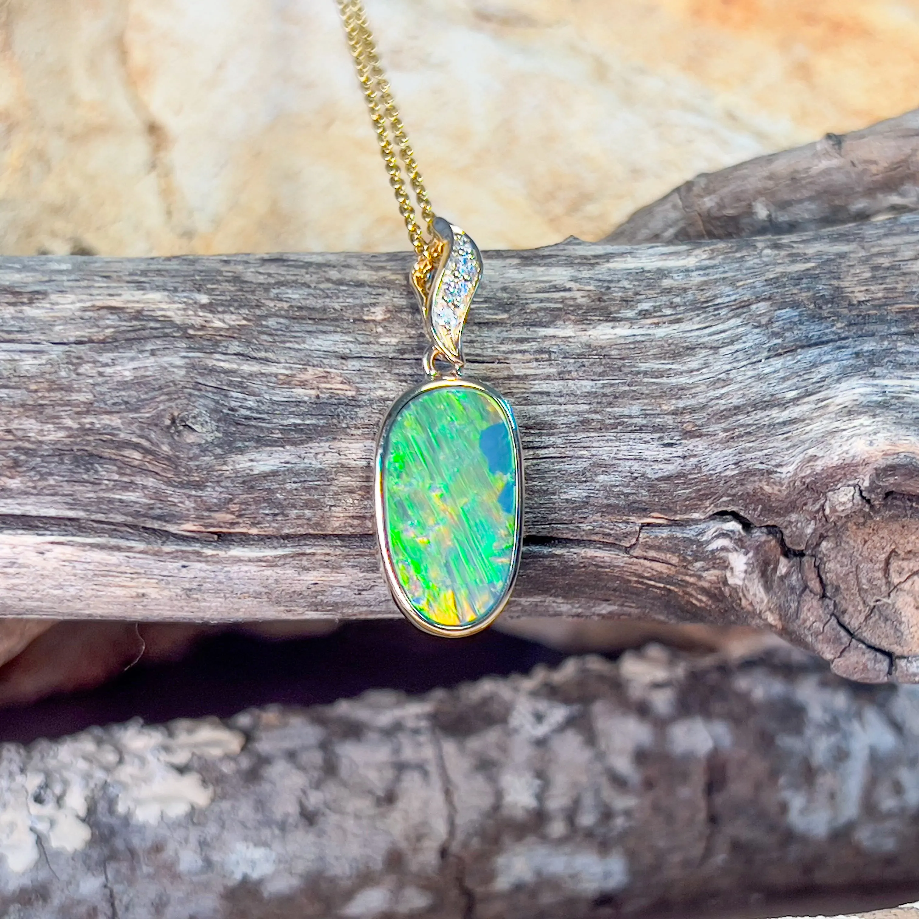 14kt Yellow Gold Opal doublet 3.1ct pendant with diamonds