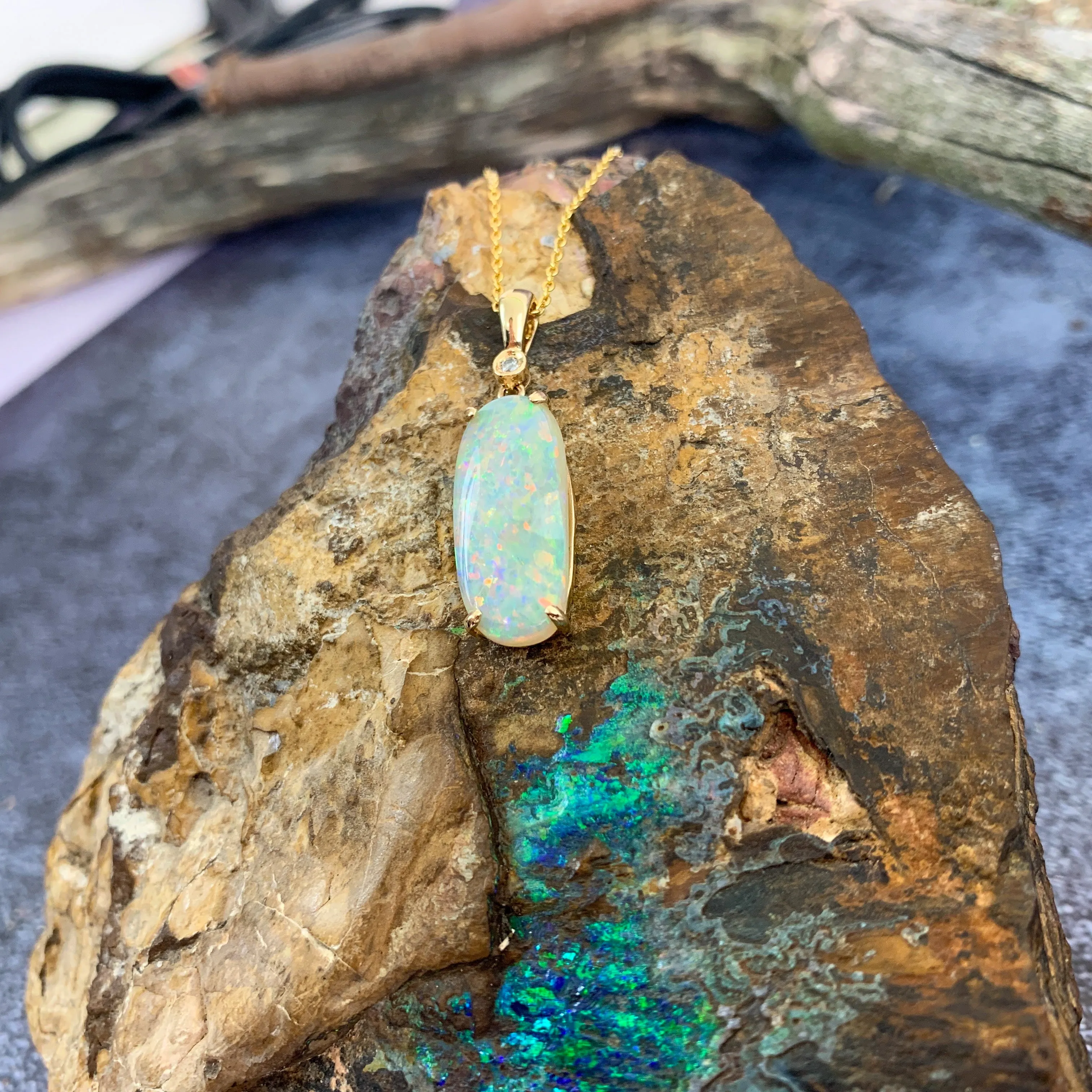 14kt Yellow Gold White Opal 4.92ct and diamond pendant