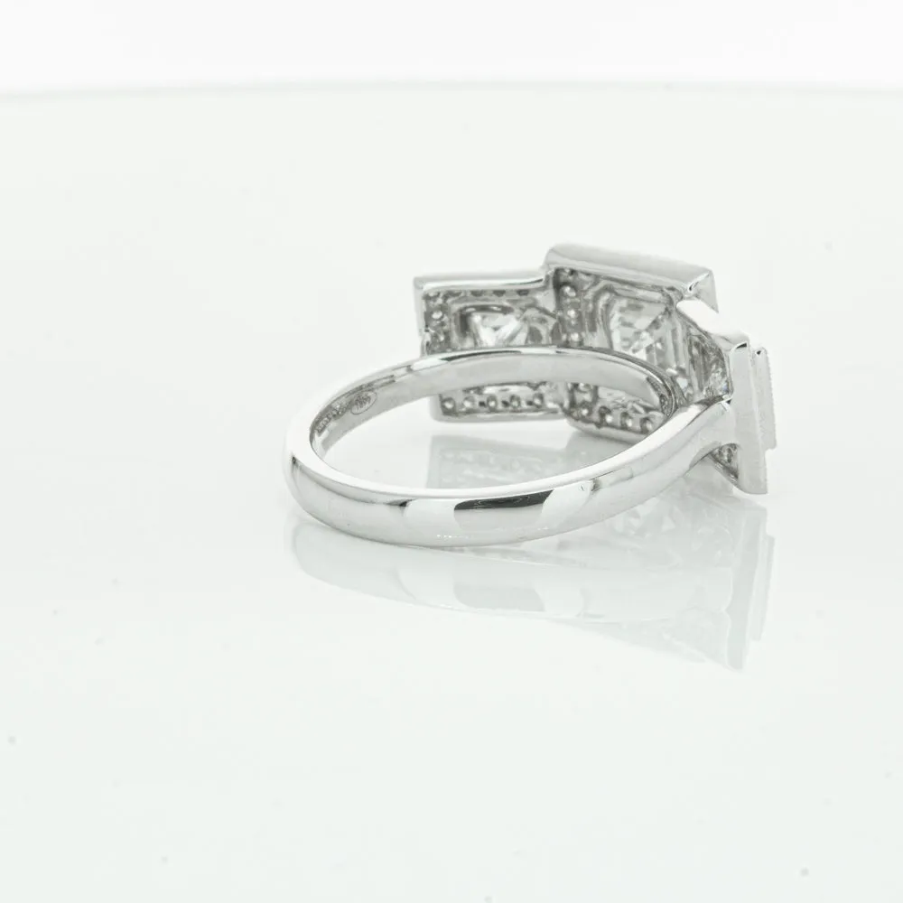 18ct White Gold 1.01ct Emerald Cut Diamond Halo Ring