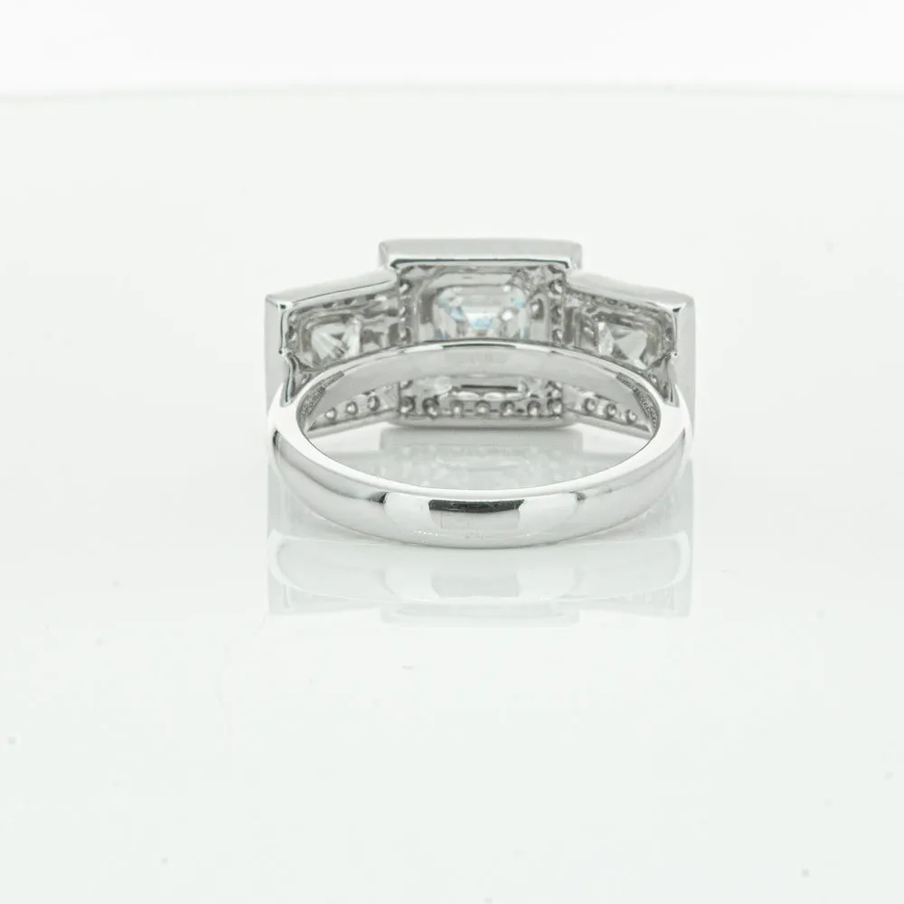 18ct White Gold 1.01ct Emerald Cut Diamond Halo Ring