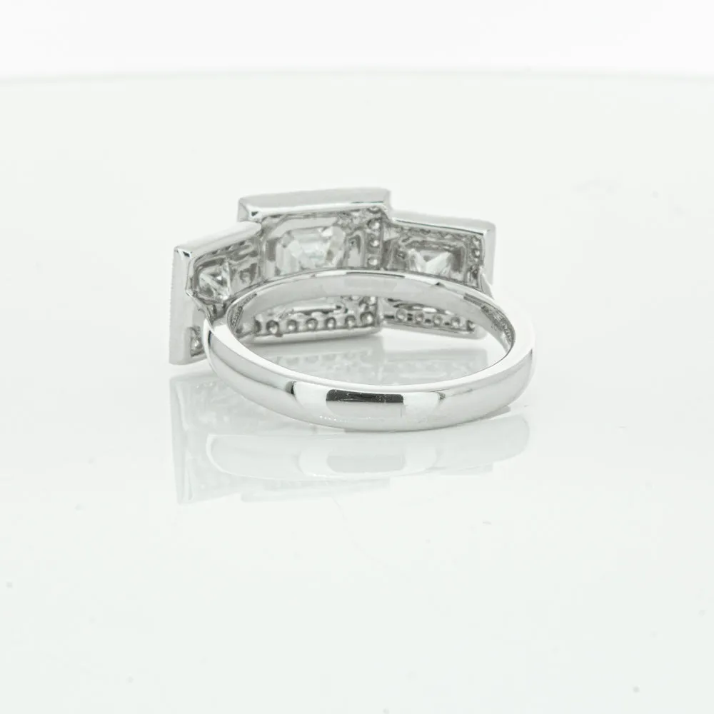 18ct White Gold 1.01ct Emerald Cut Diamond Halo Ring