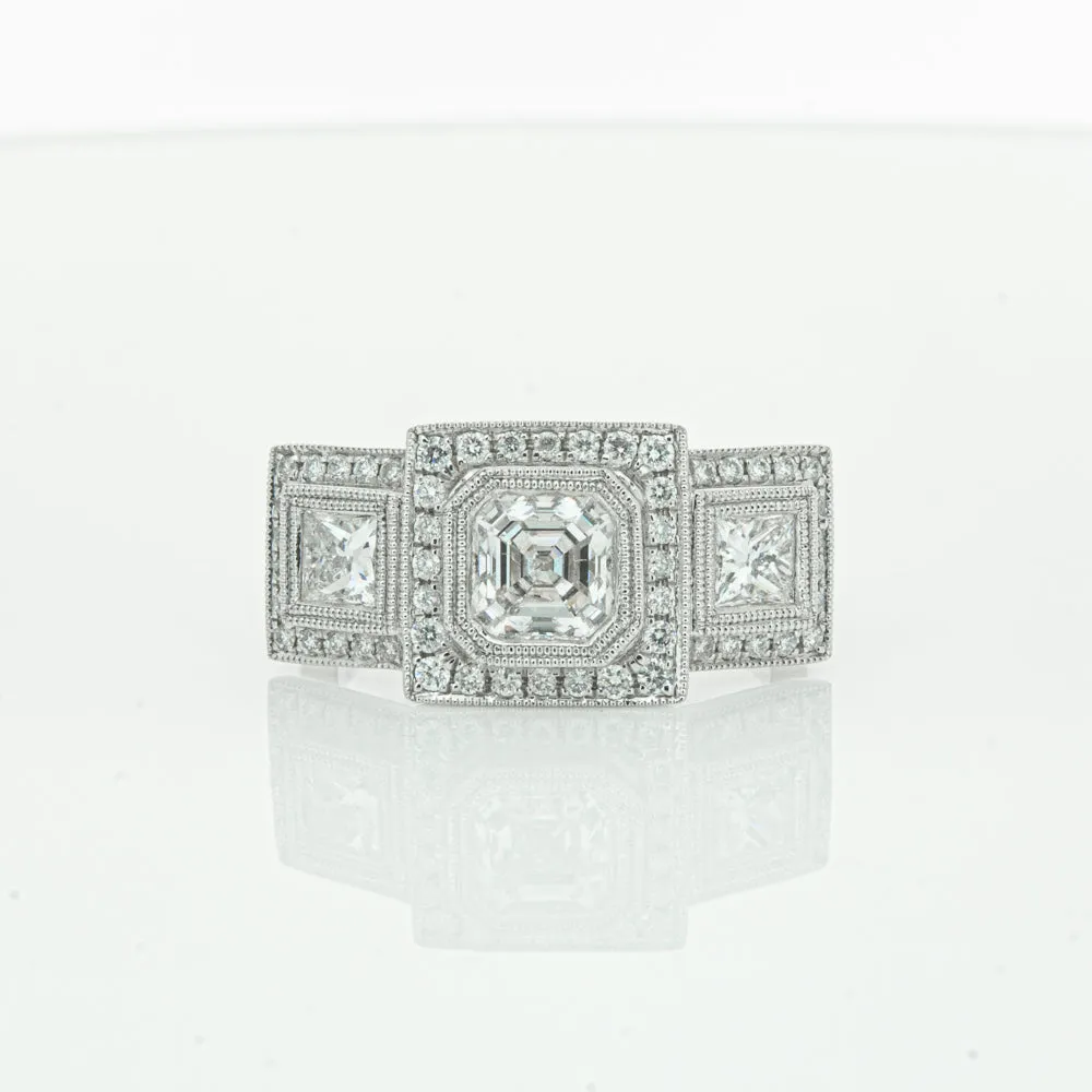 18ct White Gold 1.01ct Emerald Cut Diamond Halo Ring