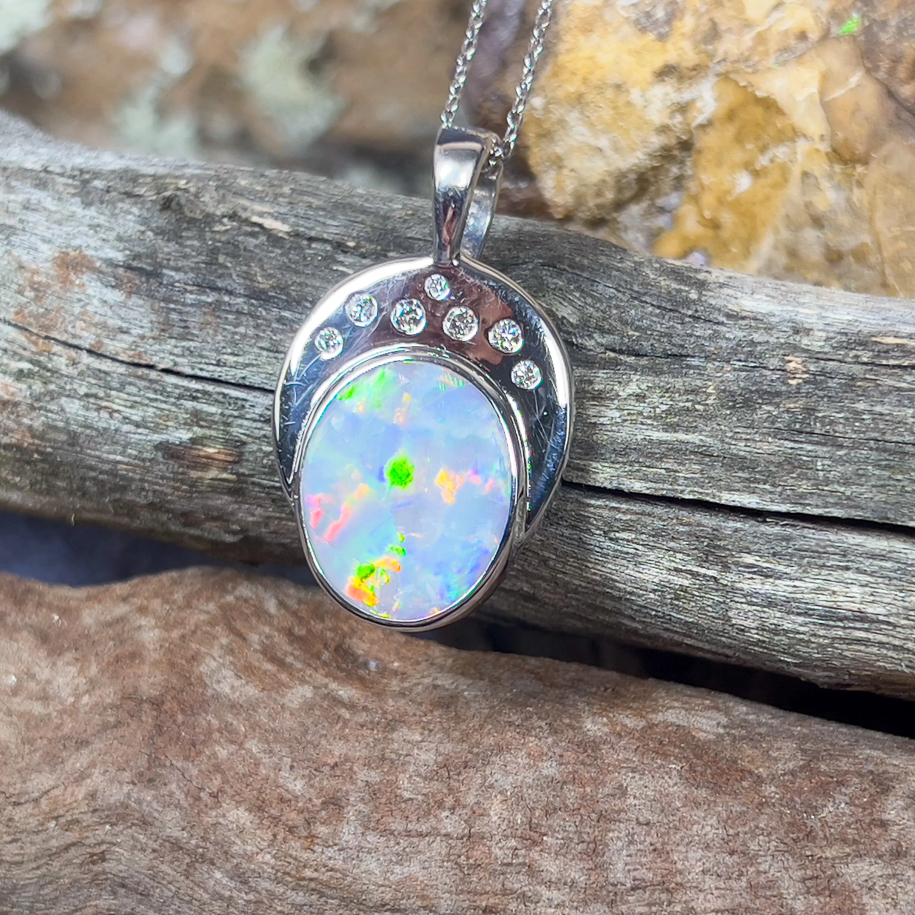 18kt Black Opal Oval 5.8ct and 7 Diamonds pendant enhancer