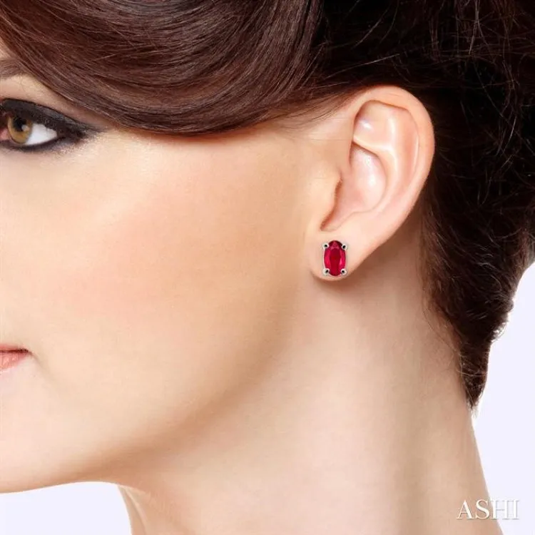 5x3MM Oval Cut Ruby Stud Earrings in 14K White Gold