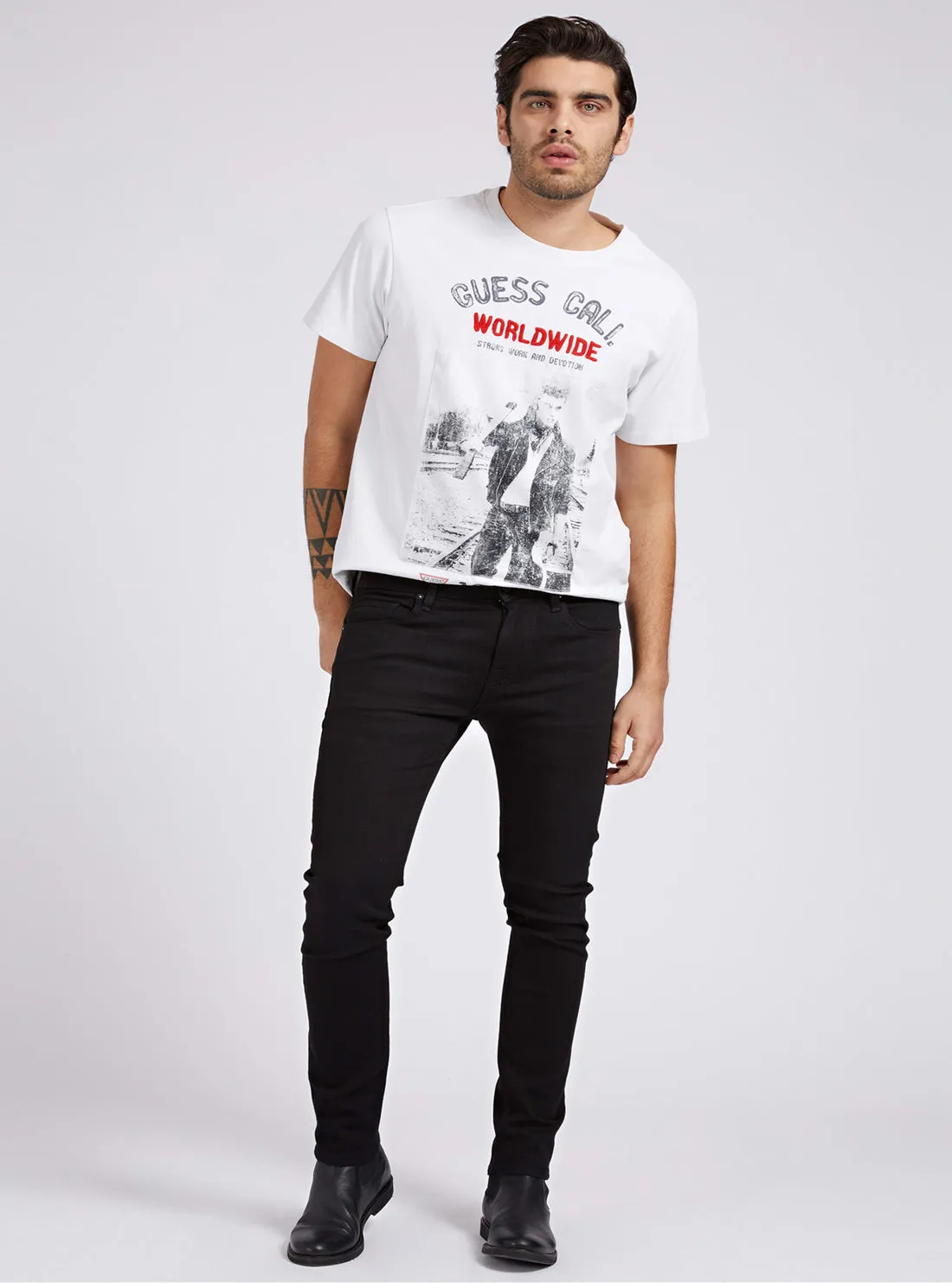 Chris Mid-Rise Super Skinny Denim Jeans in Black