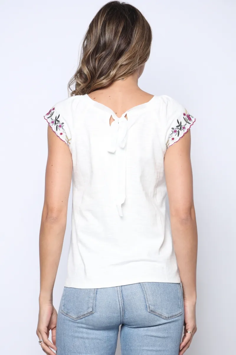 Embroidered cap sleeve tie back