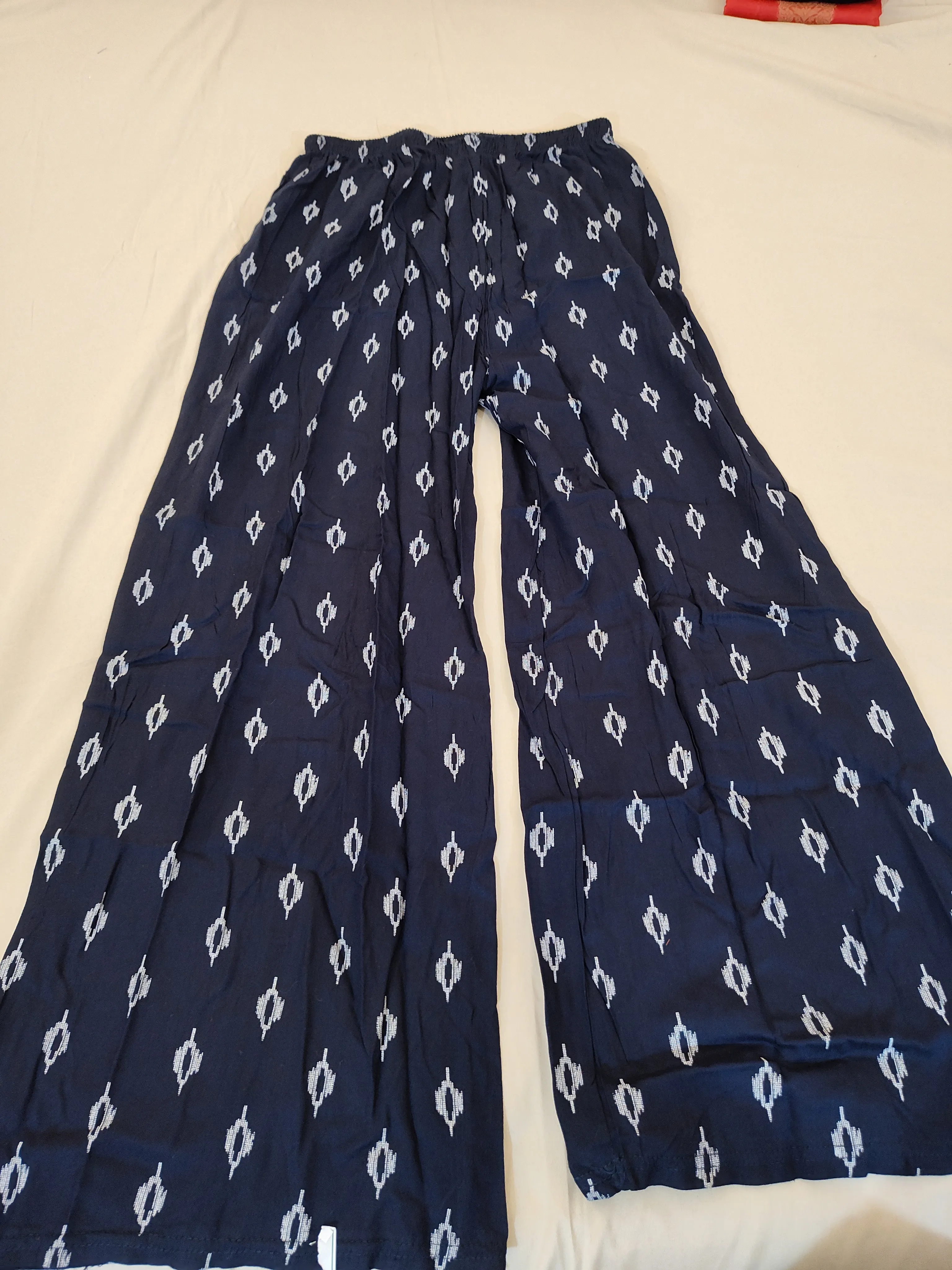 Fabulous Dark Blue Palazzo Pants With White Ikkat Print