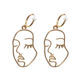 Gold human face clip on hoop earrings