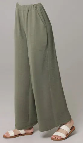 Ilham Loose Flowy Stretch Palazzo Pants - Olive