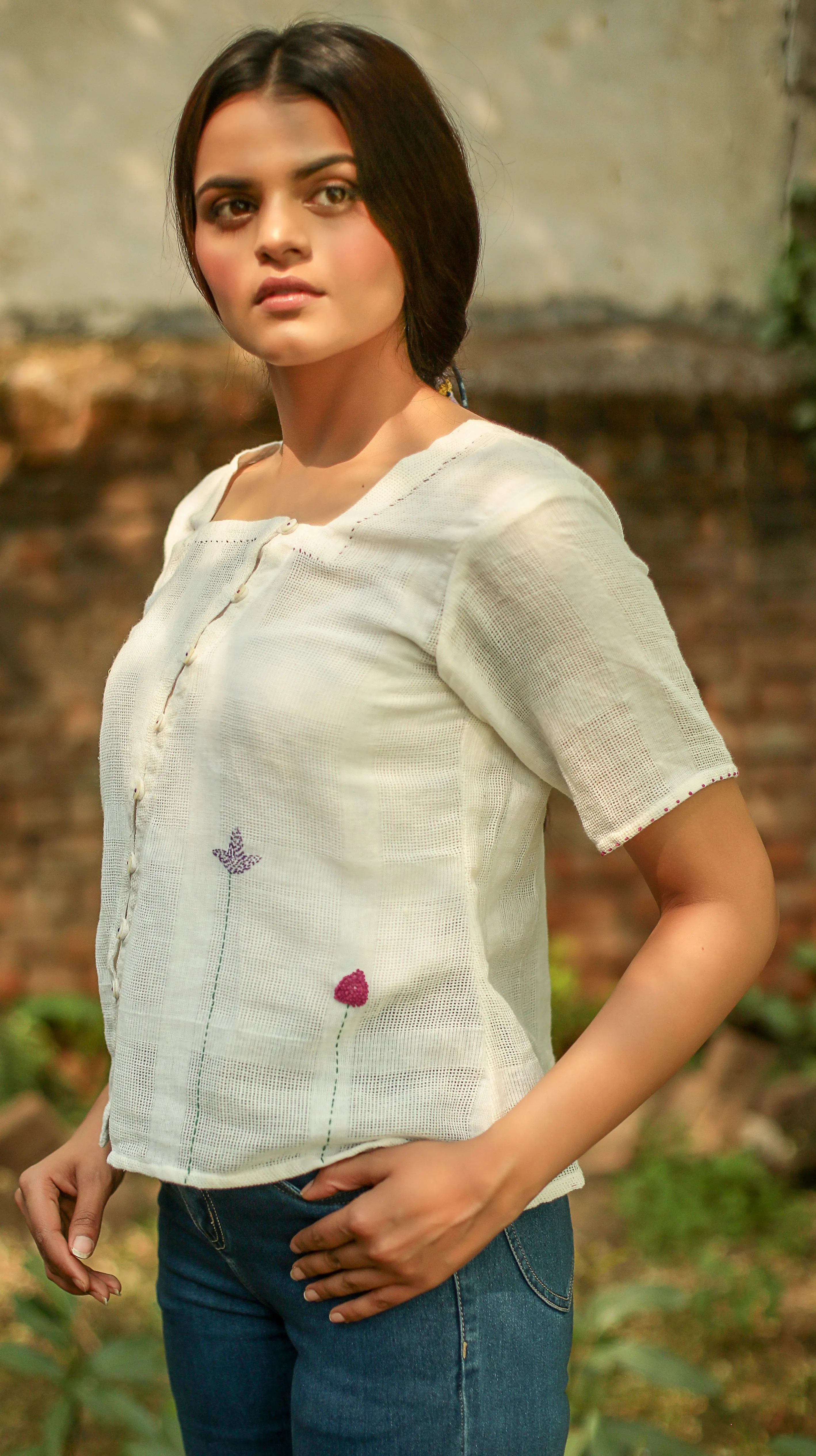 Kora embroidered button top