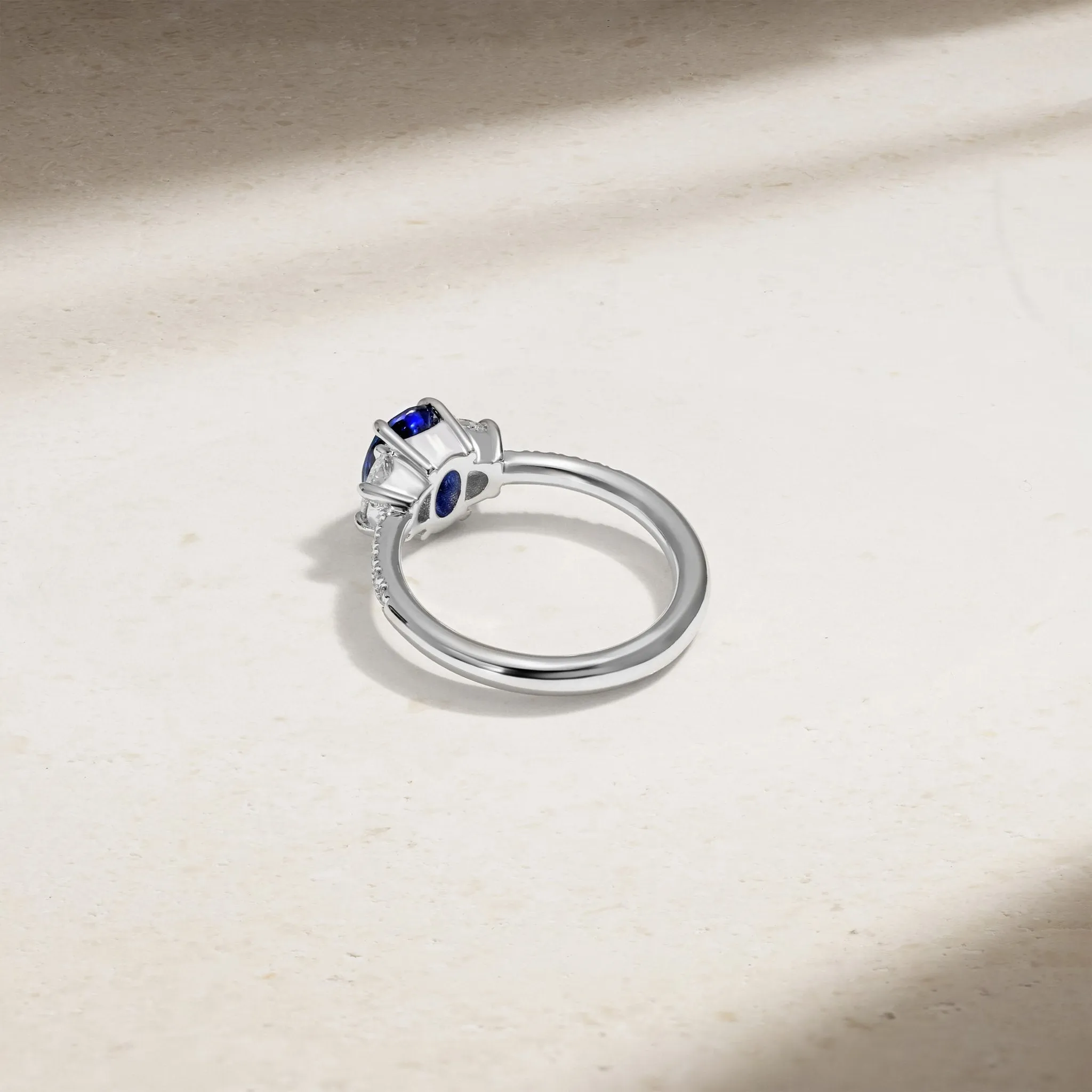 Nouveau Three Stone Oval Sapphire and Diamond Ring