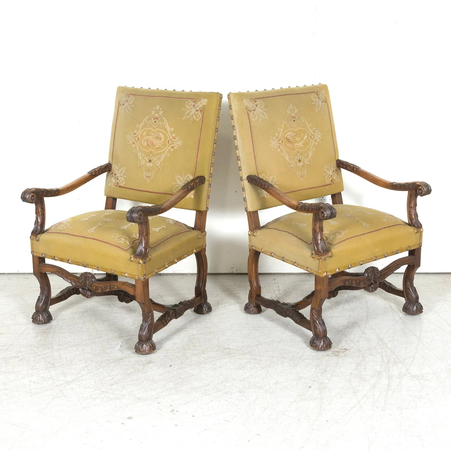 Pair of Early 19th Century French Louis XIV Style Carved Walnut Fauteuils or Armchairs