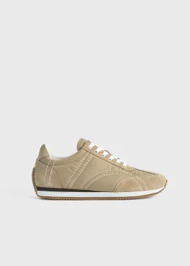 Sport sneakers sand