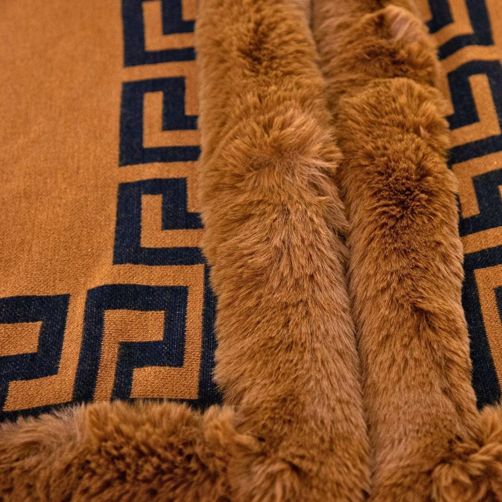 Stay cozy and stylish with our trendy Greek key design Shawl Cape Ruana Camel Faux Fur Trim Wrap