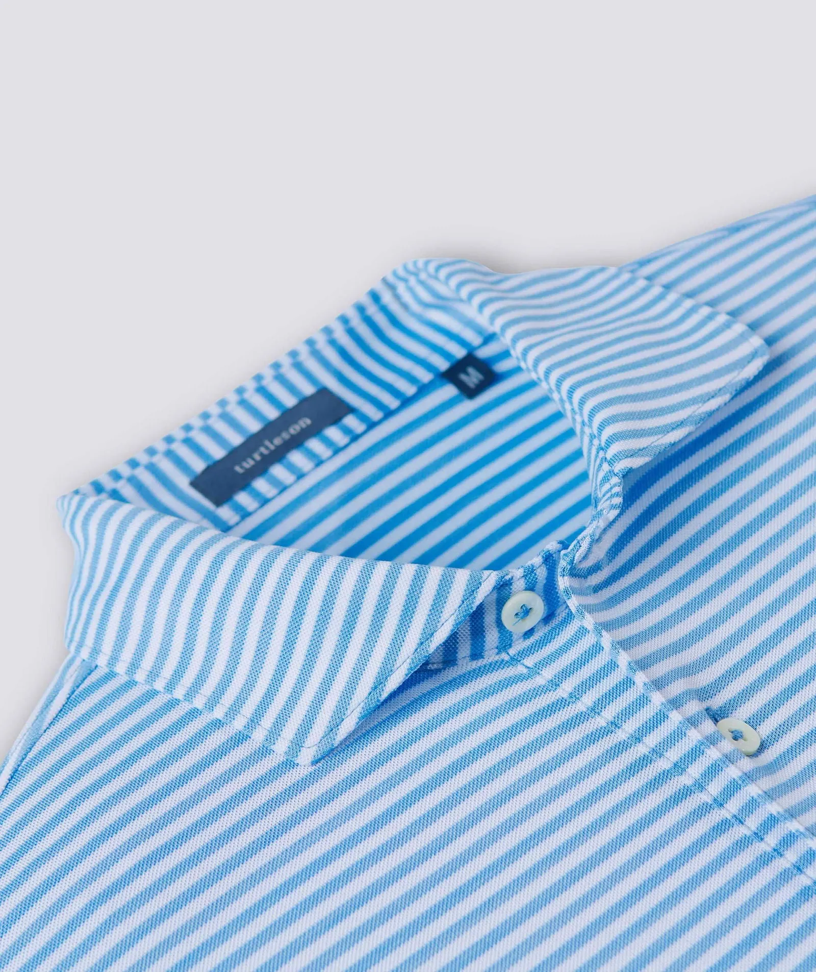 Tanner Stripe Performance Polo