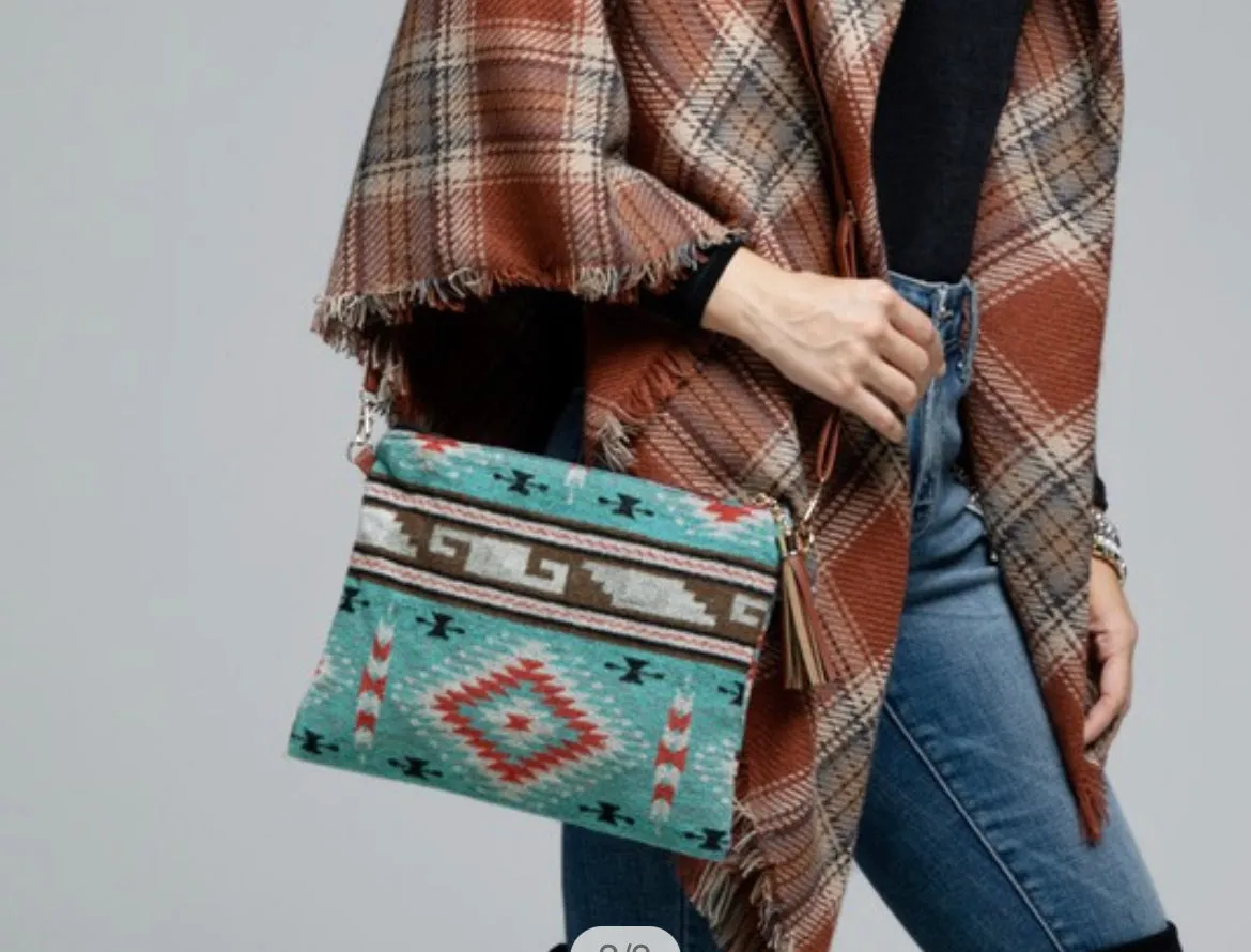 Turquoise western ethnic print with a detachable wristlet strap and tassel crossbody